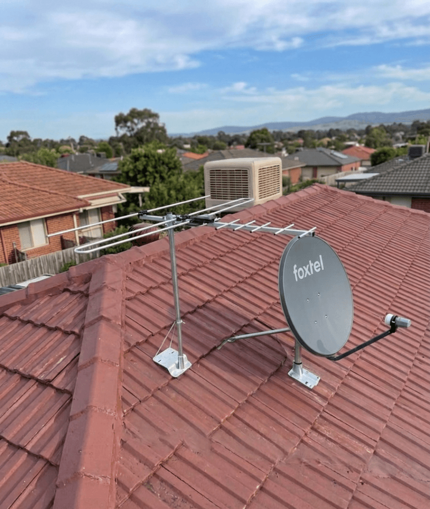Professional TV antenna and Foxtel satellite dish installation on a tiled roof in Pakenham by Titan Techs